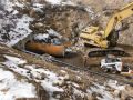 As part of a major dam rehabilitation project, an 84-inch arch concrete outlet was slip lined with a 72-inch diameter welded steel pipe.