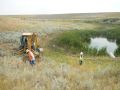 Outlet conduit and back slope of dam