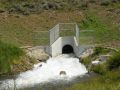 Grouted riprap armored channel.