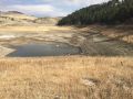 Because this dam does not have an upstream gate, the reservoir needed to be drained to access the outlet conduit.