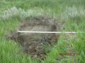 Sinkhole in slope of dam