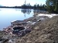 This dual chamber wet tower was installed on this remote Powell County, Montana reservoir, to provide a consistent reservoir level for duck habitat. Flash boards could be removed as needed to increase irrigation releases late in the season.