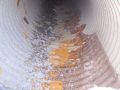 Following removal in 2013: Loss of bituminous and corrosion along pipe invert