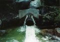 In this particular dam, following slip lining of the original pipe seepage began to appear on downstream face of the dam